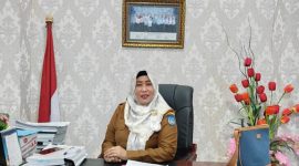 Ket. Foto : Kadisdikbud Kota Langsa, Dra Suhartini,.MPD