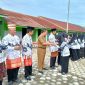 Ket. Foto : Camat Negeri Agung,  Hepi Haryanto,S.E. saat menghadiri Upacara Hari Guru Nasional di SMA N 1 Negeri Agung Selasa, (25/11/2025) 