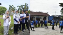 Ket. Foto : Sekda Kota Langsa Dra. Suhartini, S.Pd, M.Pd, Yang , Juga Selaku Ketua KORPRI, Membuka Turnamen Volley. 