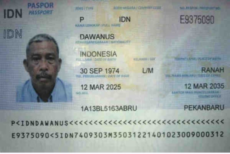 Keterangan foto : Dawanus Mahmud Muhammad (52 tahun), pemegang paspor nomor E9375090 yang beralamat di Ranah RT 01 RW 03, Kabupaten (ist) 
