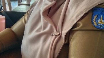 Keterangan Foto: R, pegawai P3K korban fitnah perbuatan mesum oleh oknum tidak bertanggung jawab.