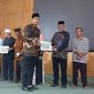 Ket. Foto : Penyaluran Zakat Infak dan Sedekah tahun 2024 dan penyaluran Zakat Asnaf Fakir dan Miskin tahun 2025, di Aula Gedung Cakra Donya Langsa Kota, Kamis (25 September 2025).