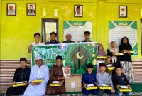 Ket. Foto : Pimpinan Cabang Serikat Mahasiswa Muslimin Indonesia (SEMMI) Kota Langsa Menyalurkan bantuan Al-Qur'an Serta Santunan kepada anak Yatim.