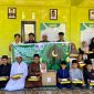 Ket. Foto : Pimpinan Cabang Serikat Mahasiswa Muslimin Indonesia (SEMMI) Kota Langsa Menyalurkan bantuan Al-Qur'an Serta Santunan kepada anak Yatim.