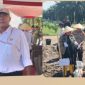 Kapolres Kampar, AKBP Boby Putra Ramadhan S., S.I.K., M.H., bersama Ketua Umum LCI, Sunggul Manalu, dalam kegiatan Penanaman Jagung Kuartal II di lahan Koperasi Produsen Petani Sawit Makmur (KOPPSA-M), Desa Pangkalan Baru, Kecamatan Siak Hulu. 

