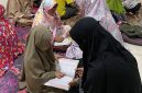 Keterangan Foto: Suasana kegiatan belajar mengaji malam hari di Posko KKN IAIN Langsa, Dusun Karang Sari, Desa Tanjung Putus.